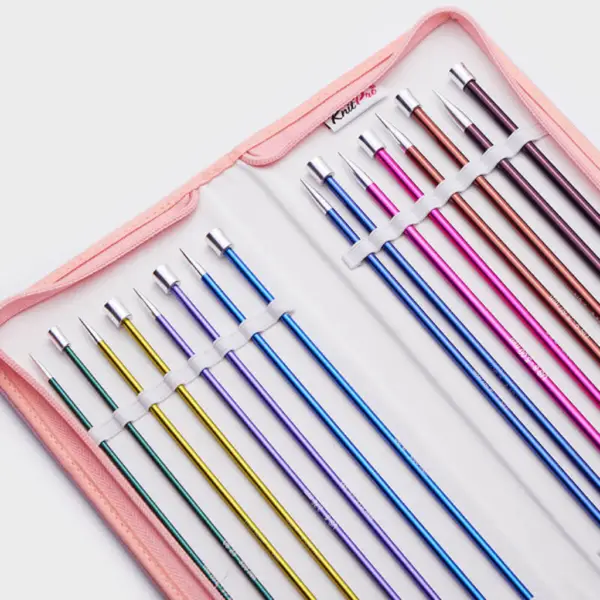 Close up photo of set of 8 pairs of KnitPro zing needles in a pink fabric zippered case